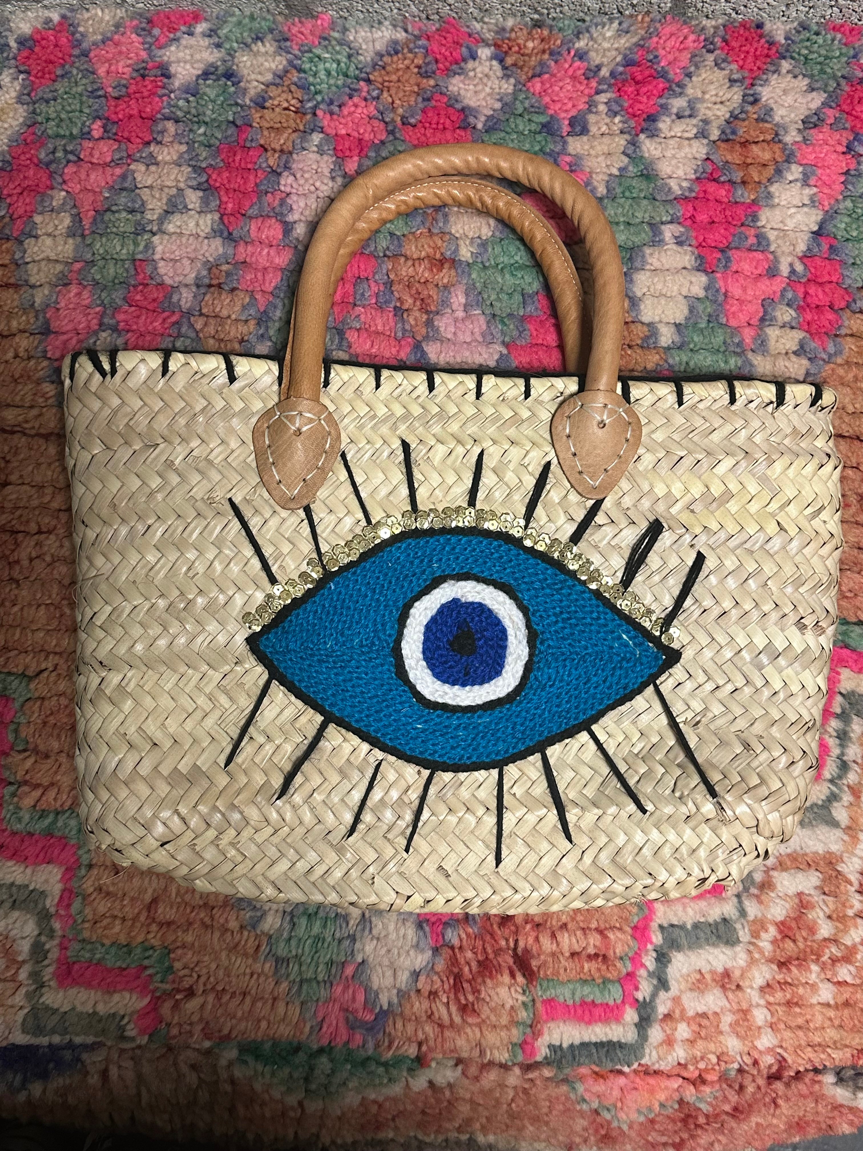 Boho Rieten tas met evil eye - blauw met gouden pailleten